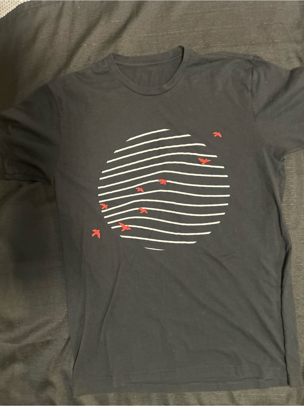 Red Canary Men's Black Graphic Tee with White Stripe Circle and Red Bird Accents